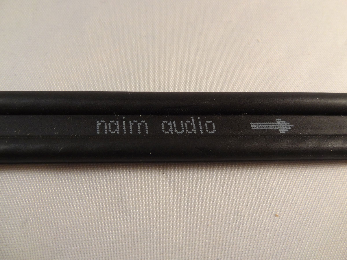 Naim NAC A5 is a direction sensitive cable - arrow points towards your speakers